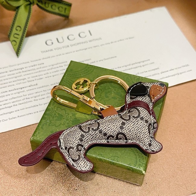 Gucci Dog-shaped bag charm 821812