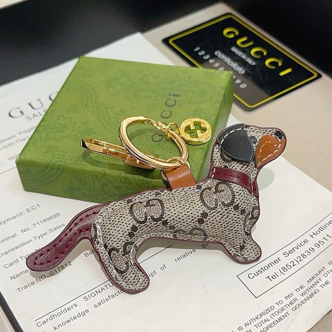Gucci Dog-shaped bag charm 821812